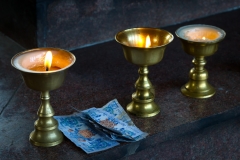 Butter lamps and offering, Bhutan.